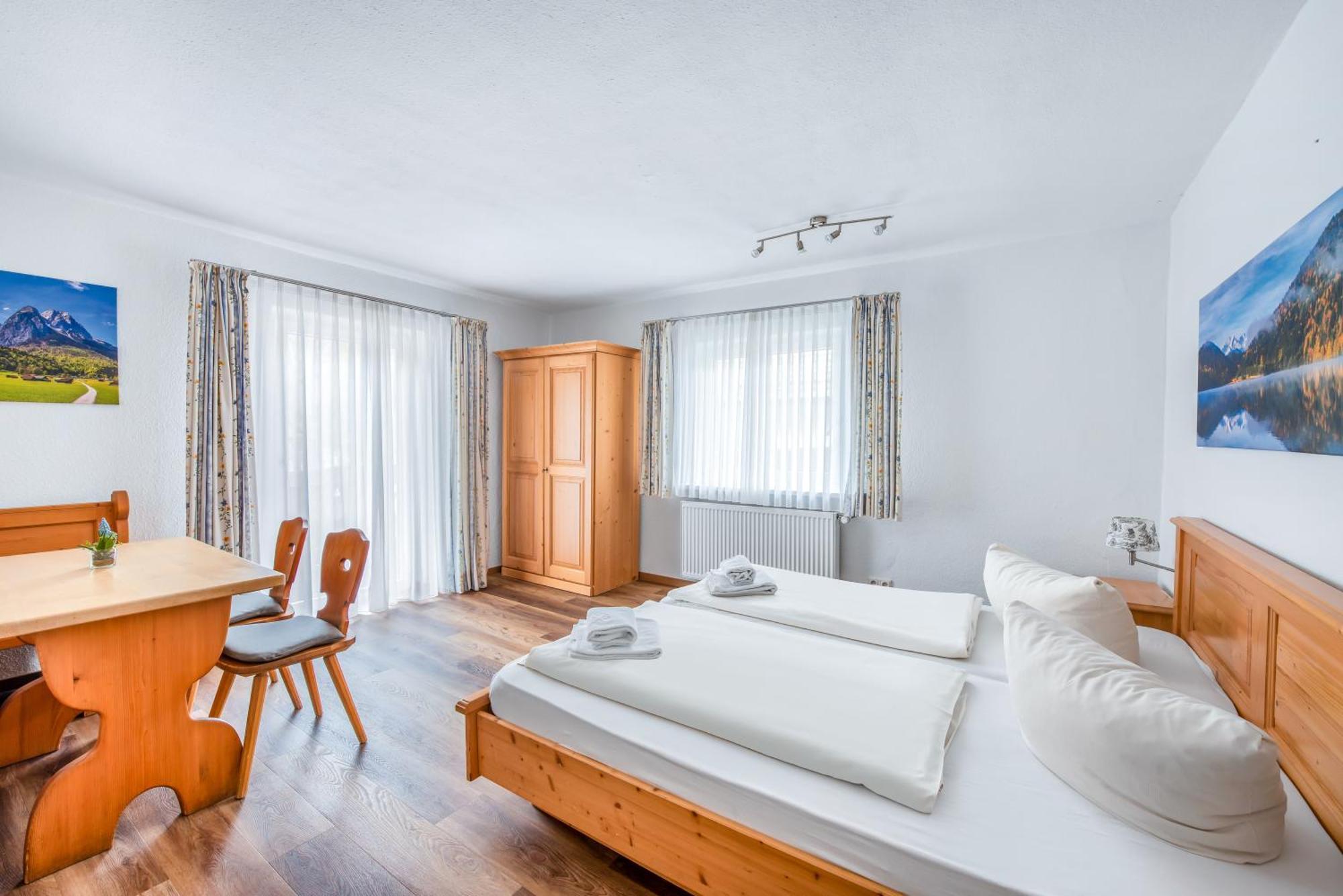Hotel Garni Nuss Грайнау Экстерьер фото